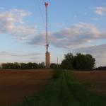 Looking south at the tower from the gate at the driveway