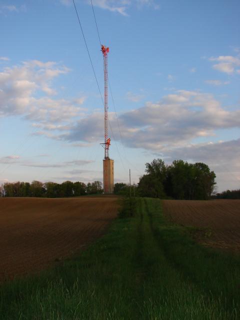 Looking south at the tower from the gate at the driveway